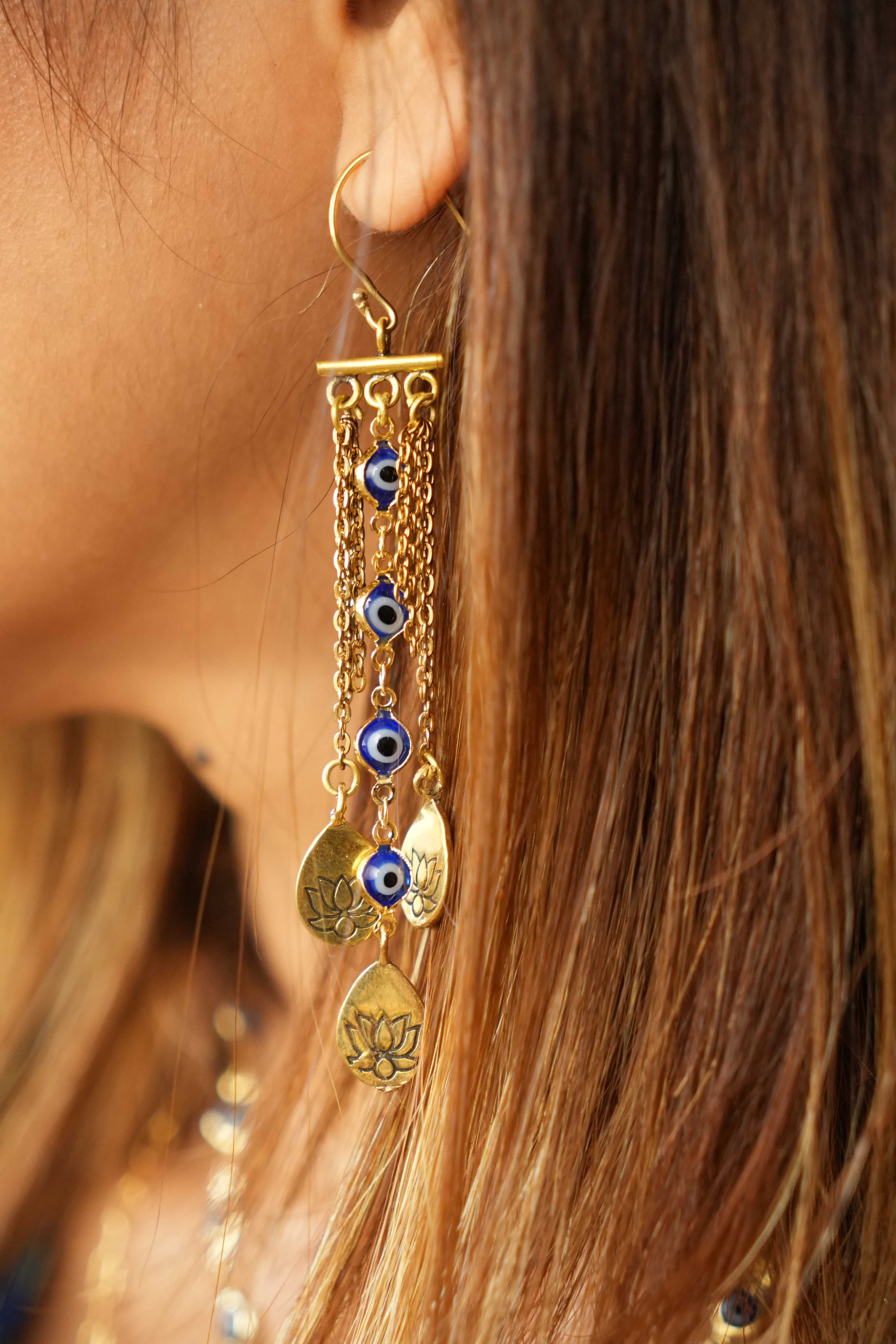 Evil eye dancing brass droplets - Image 2